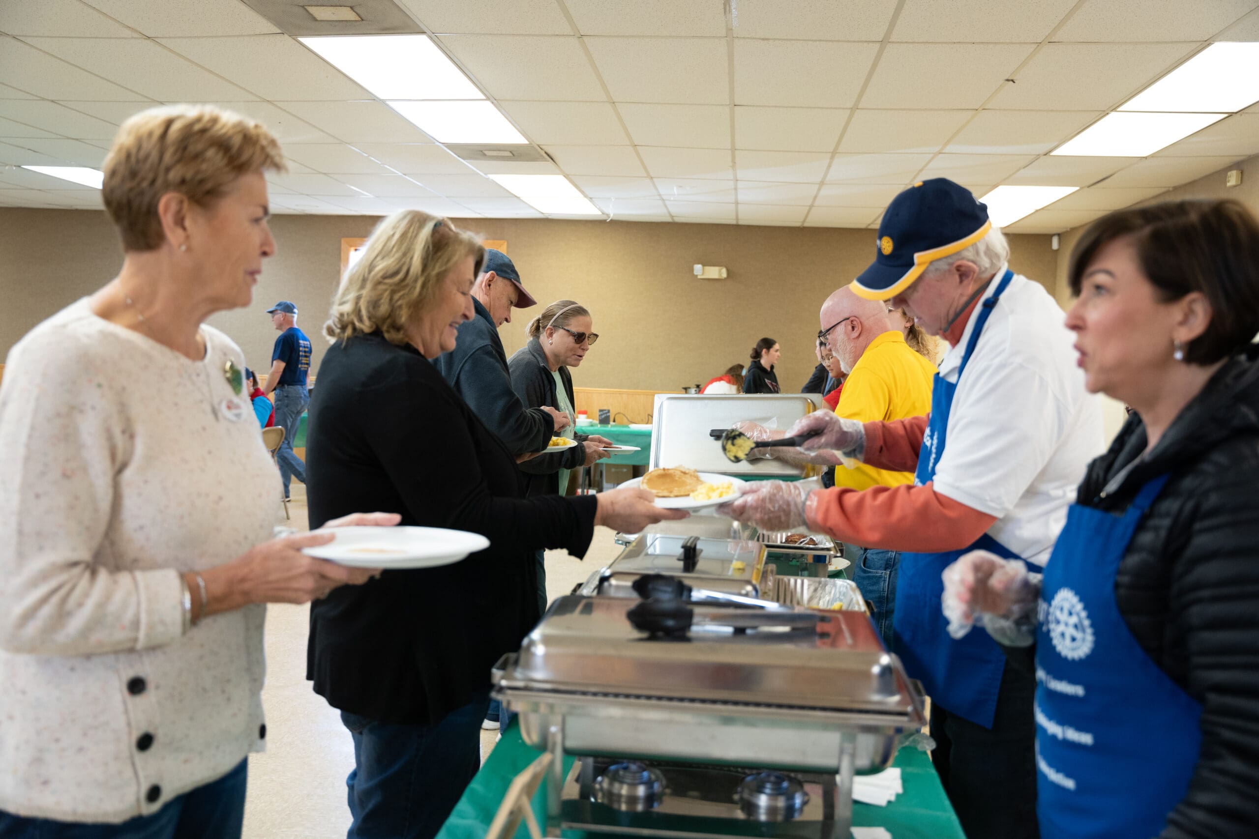 Festival volunteers serving the community