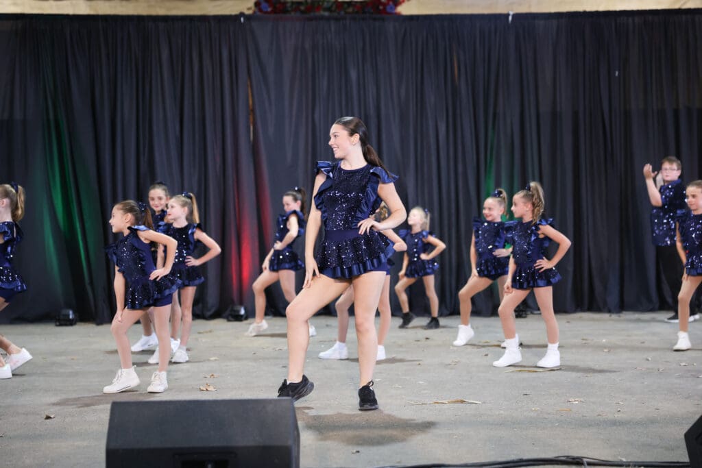 A youth dance team performs during Sunday Live Performances at the fairgrounds